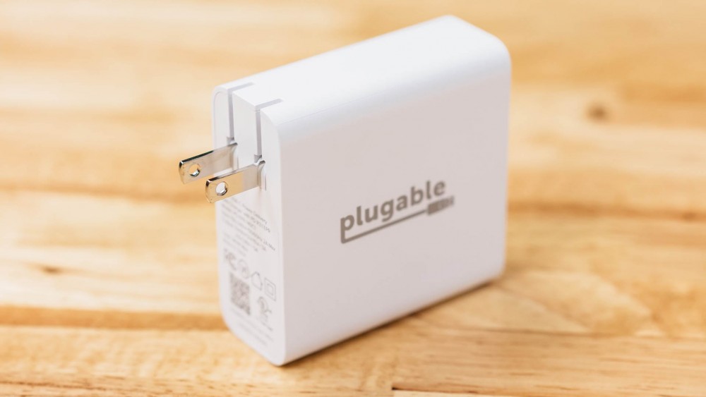 The Plugable 140W GaN Charger with prongs folded out.